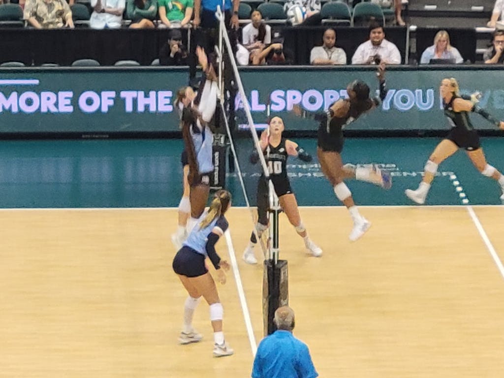 Wahine Volleyball action at the net